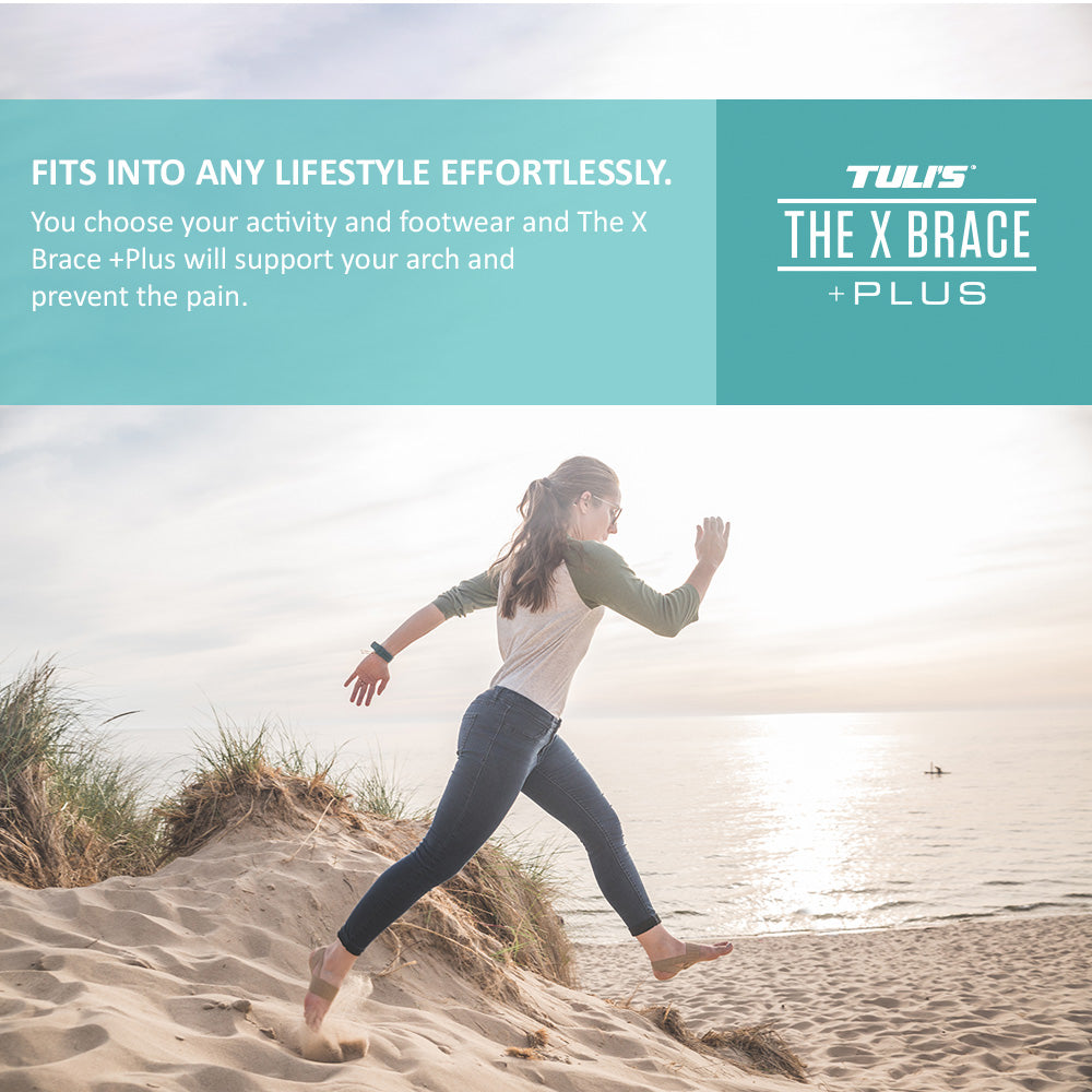 lady walking at the beach barefoot wearing the Tuli's The X Brace PLUS