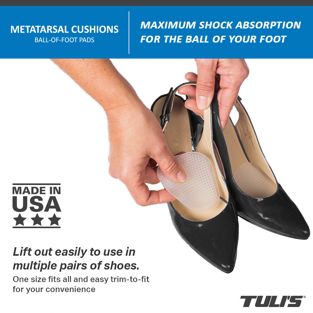 hand inserting Tuli's Metatarsal Cushion into shoe